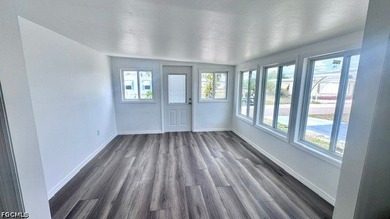 Welcome to the highly sought-after 55+ gated waterfront - photo 5