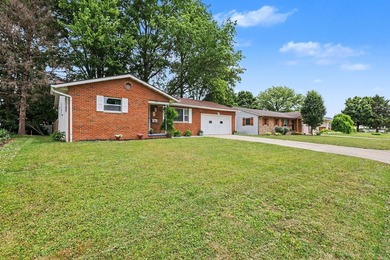 Welcome home to this beautifully updated brick ranch in the - photo 3