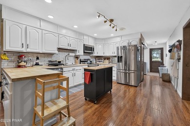 This well-maintained raised ranch offers 3 bedrooms, 3 full - photo 18