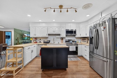 This well-maintained raised ranch offers 3 bedrooms, 3 full - photo 19