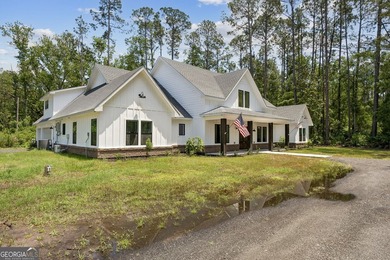 This custom-built home is situated on approximately 3 acres and - photo 11