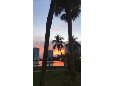 Floor to ceiling windows offer stunning lake, skyline, & sunset - photo 12