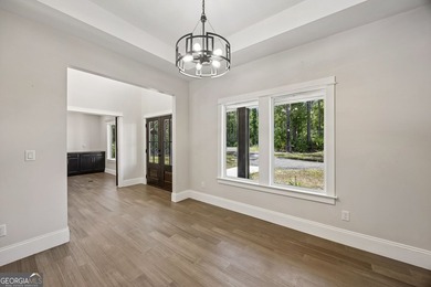 This custom-built home is situated on approximately 3 acres and - photo 22