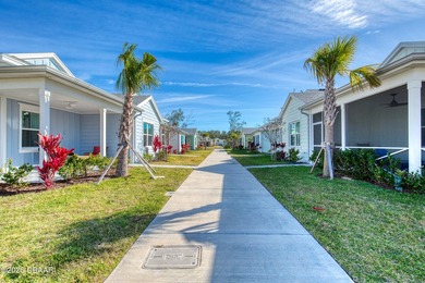 Don't miss your chance to own this charming Dreamsicle Cottage - photo 2