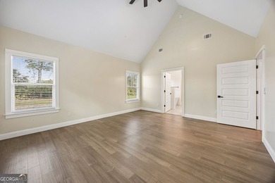 This custom-built home is situated on approximately 3 acres and - photo 32
