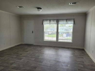 Own your own home in a quiet, well-maintained 55+ neighborhood! - photo 2