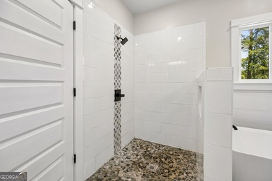 This custom-built home is situated on approximately 3 acres and - photo 34