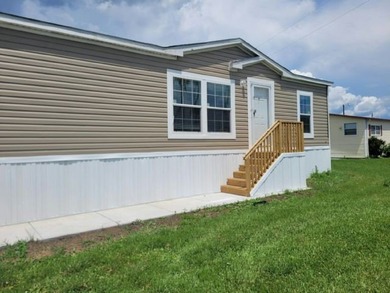 Own your own home in a quiet, well-maintained 55+ neighborhood! - photo 4