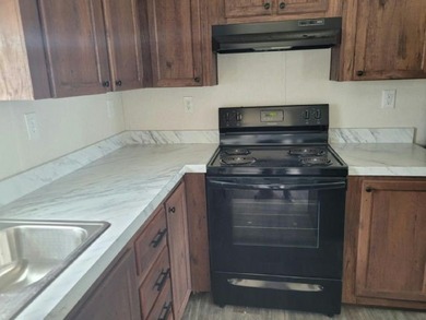 Own your own home in a quiet, well-maintained 55+ neighborhood! - photo 5