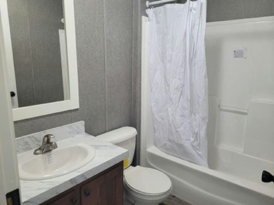Own your own home in a quiet, well-maintained 55+ neighborhood! - photo 6