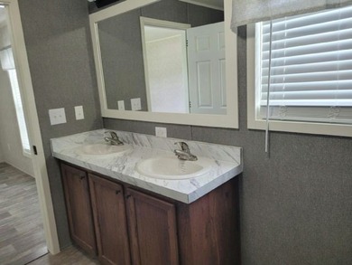 Own your own home in a quiet, well-maintained 55+ neighborhood! - photo 10