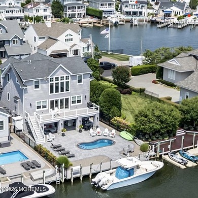 Welcome to this stunning 4-bedroom, 3 1/2-bath waterfront home - photo 1