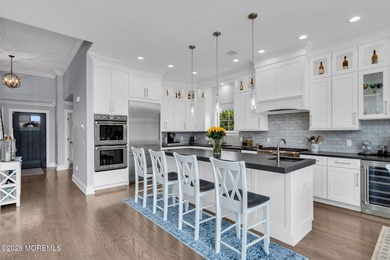 Welcome to this stunning 4-bedroom, 3 1/2-bath waterfront home - photo 3