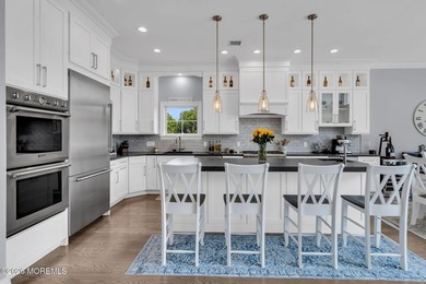 Welcome to this stunning 4-bedroom, 3 1/2-bath waterfront home - photo 5