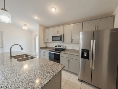 MOTIVATED SELLER. Located in a nice, friendly neighborhood in - photo 4