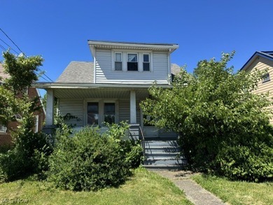 Investment Opportunity in this cape cod style home on the - photo 1