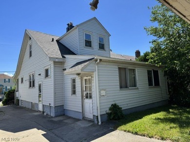 Investment Opportunity in this cape cod style home on the - photo 4