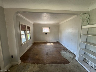 Investment Opportunity in this cape cod style home on the - photo 7