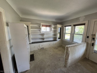 Investment Opportunity in this cape cod style home on the - photo 8
