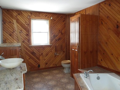 Here's a home in town Madison with lots of charm. Spacious - photo 17