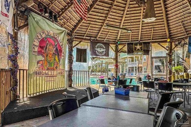 Tucked inside the highly sought-after Purple Parrot Resort, this - photo 32