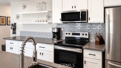 THIS ONE HAS IT ALL ! This beautifully upgraded, turnkey 1- - photo 1
