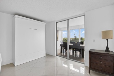 Pristine and fully updated, this penthouse-level 1-bedroom plus - photo 9
