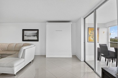 Pristine and fully updated, this penthouse-level 1-bedroom plus - photo 10