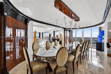 Perched atop Williams Island, this extraordinary double - photo 11