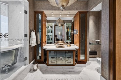 Perched atop Williams Island, this extraordinary double - photo 43