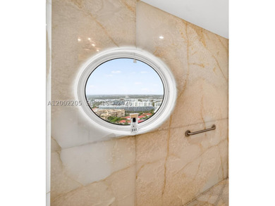 Perched atop Williams Island, this extraordinary double - photo 49