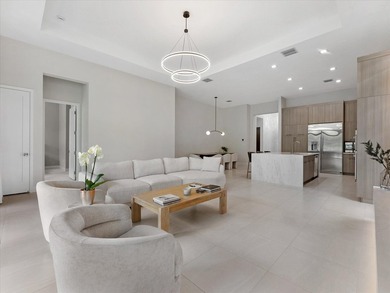 Welcome to this stunning 2025 built home in Lotus Edge, set on - photo 10