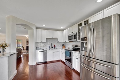 RENOVATED CORNER UNIT: 4BR/2.5BA w/ WATERFRONT FOUNTAIN views in - photo 12