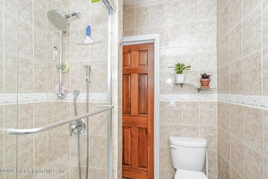 Welcome to this well-maintained three-family home in the highly - photo 14