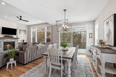 Luxury, low-maintenance living meets peaceful wooded privacy in - photo 15