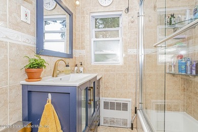 Welcome to this well-maintained three-family home in the highly - photo 15
