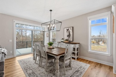 Luxury, low-maintenance living meets peaceful wooded privacy in - photo 16