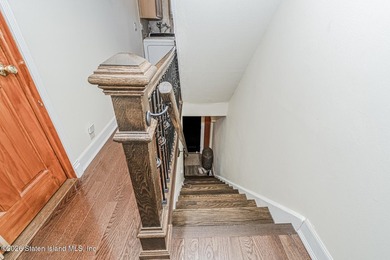 Welcome to this well-maintained three-family home in the highly - photo 17