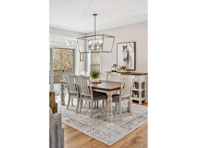 Luxury, low-maintenance living meets peaceful wooded privacy in - photo 18