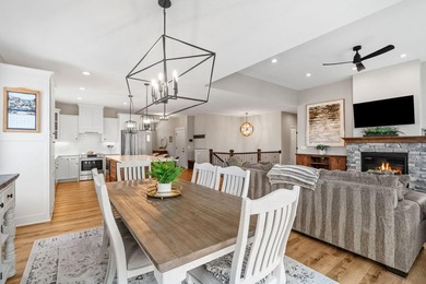 Luxury, low-maintenance living meets peaceful wooded privacy in - photo 19