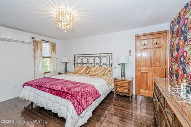 Welcome to this well-maintained three-family home in the highly - photo 19