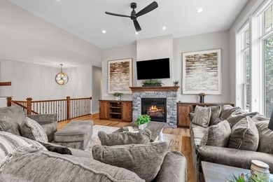 Luxury, low-maintenance living meets peaceful wooded privacy in - photo 20