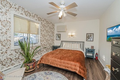 Welcome to this well-maintained three-family home in the highly - photo 20