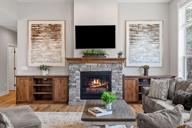 Luxury, low-maintenance living meets peaceful wooded privacy in - photo 21