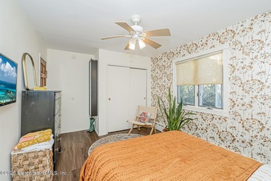 Welcome to this well-maintained three-family home in the highly - photo 21