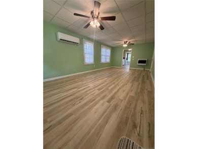 This property features a spacious two-bedroom layout with a - photo 3