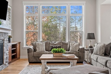 Luxury, low-maintenance living meets peaceful wooded privacy in - photo 23