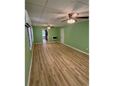 This property features a spacious two-bedroom layout with a - photo 4