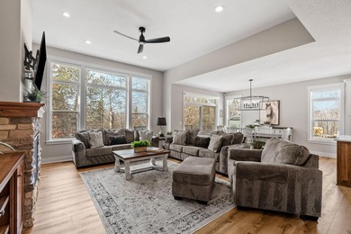 Luxury, low-maintenance living meets peaceful wooded privacy in - photo 24