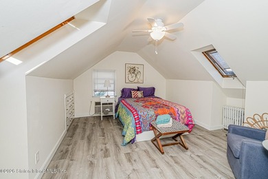 Welcome to this well-maintained three-family home in the highly - photo 24